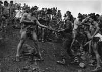 Sebastiao Salgado - Military Police Patrolling the Gold Mine at Serra Pelada, State of Para, Brazil, 1986