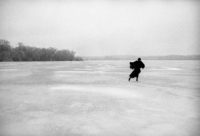 Joel Bernstein, Joni Mitchel Skating on Lake Mendota with Treeline, Madison, WI, March 1976