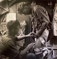 Rescue at Rabaul: Bandaging Wounded Bomber, 1944